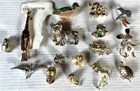 16 brooches and or pins