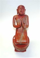 Good Burmese carved wood kneeling monk figure