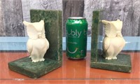 Resin owls on granite bookends