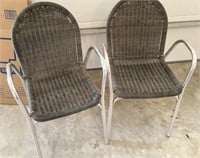Pair of woven stacking chairs