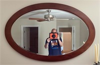 Oval beveled glass wall mirror