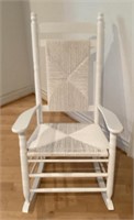 White rocker with rush seat and back