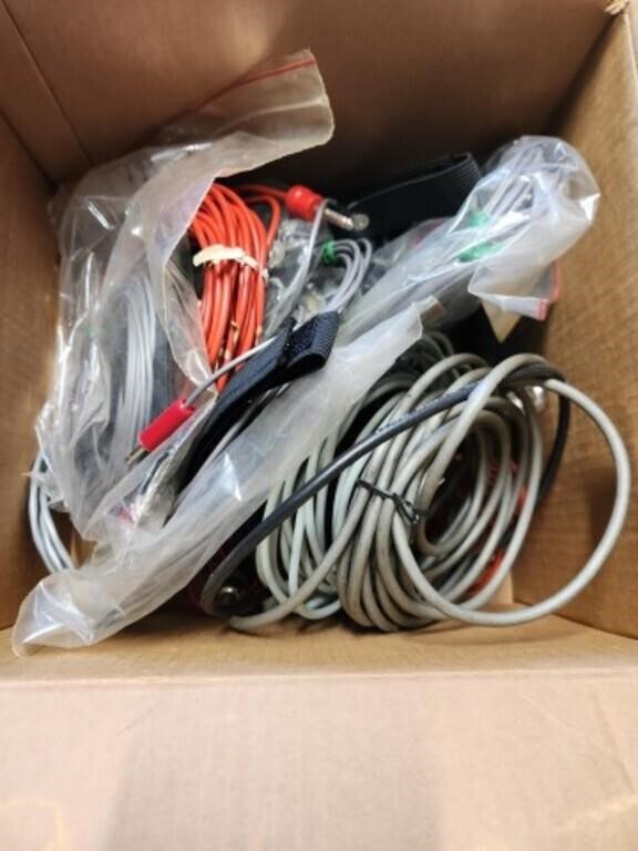 Lot of assorted electronic cables. As