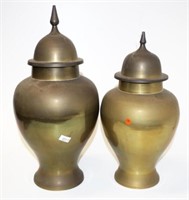 Two lidded brass urns