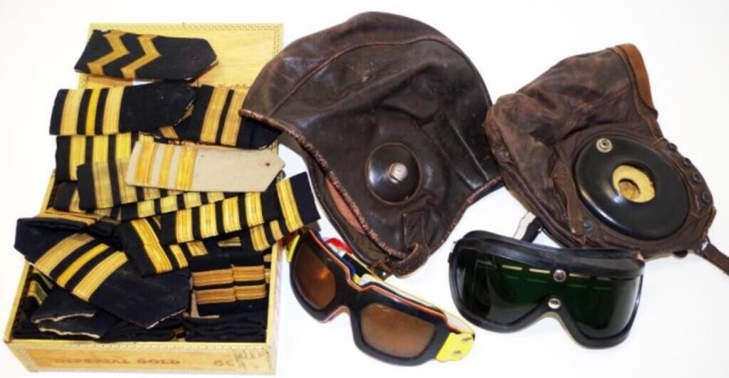Two leather aviator helmets