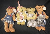 Four 'as new' teddy bears