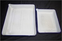 Two graduated early white enamel photography trays