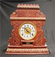 Antique oak cased mantle clock
