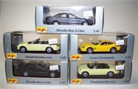 Five various Maisto model cars