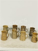 8 Shaw GMC pottery beer steins