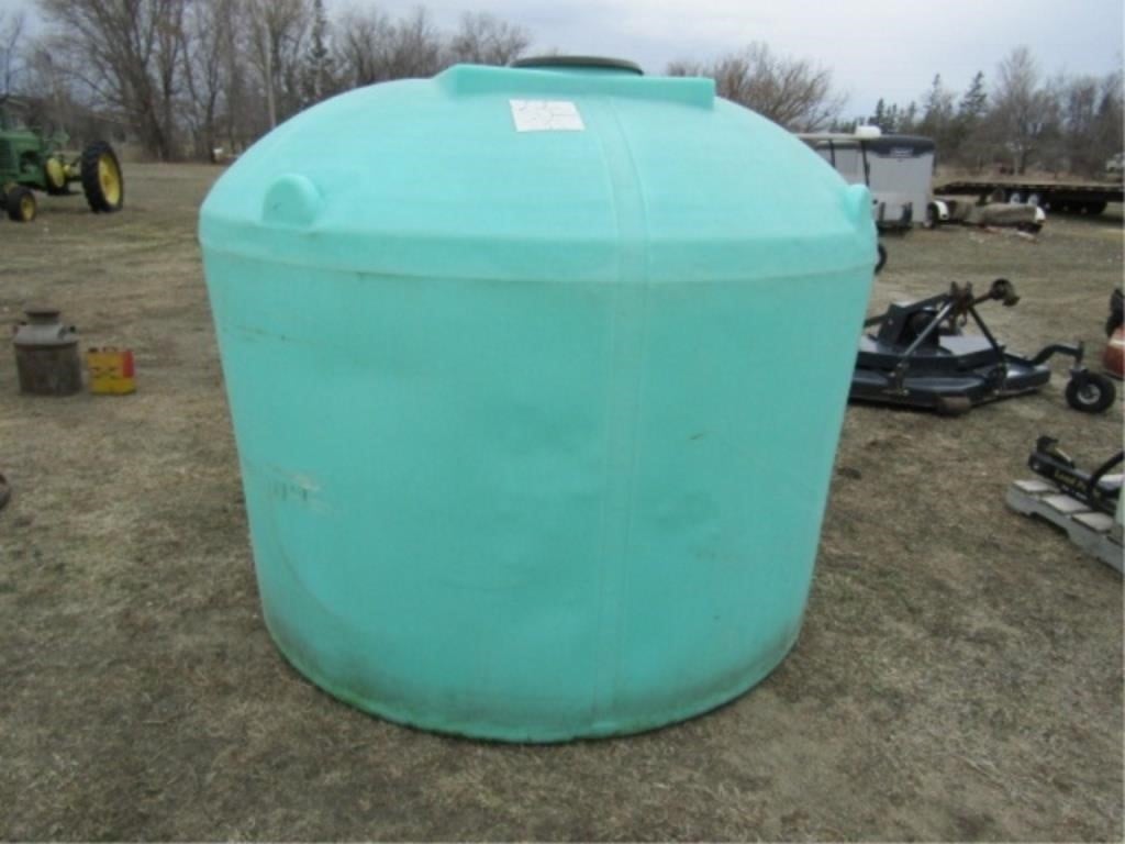 1200 Gal. Poly Tank w/2 Valves, one missing Handle