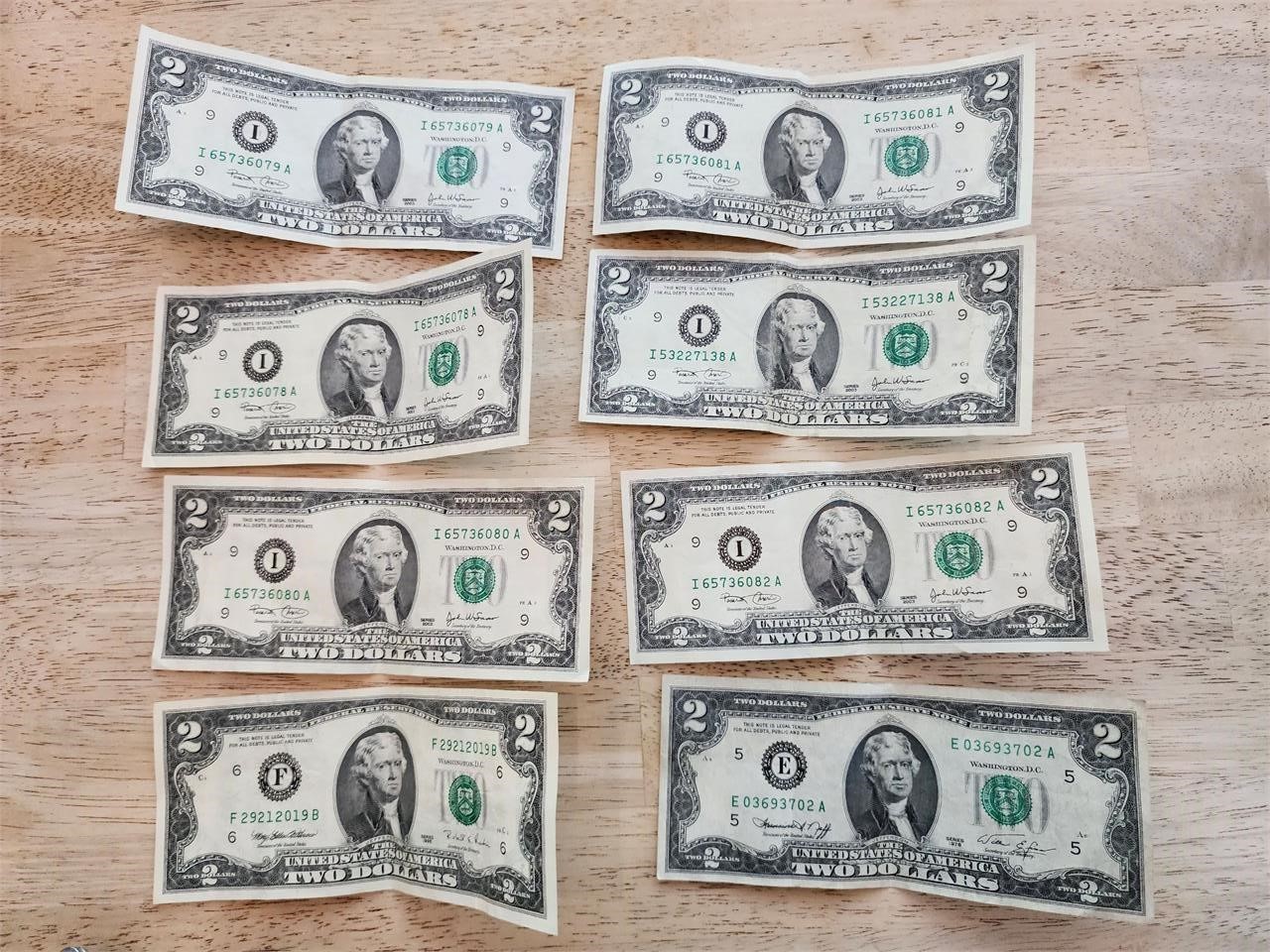 8 Two dollar bills