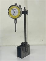 Machinist dial indicator on magnetized stand