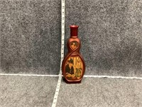 Old Red Liquor Bottle with Gare Saint Lazare Art