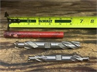 (2) cutting tools, end mills one is Cleveland