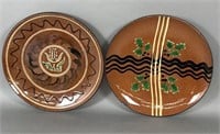 2 folk art slip decorated redware plates by