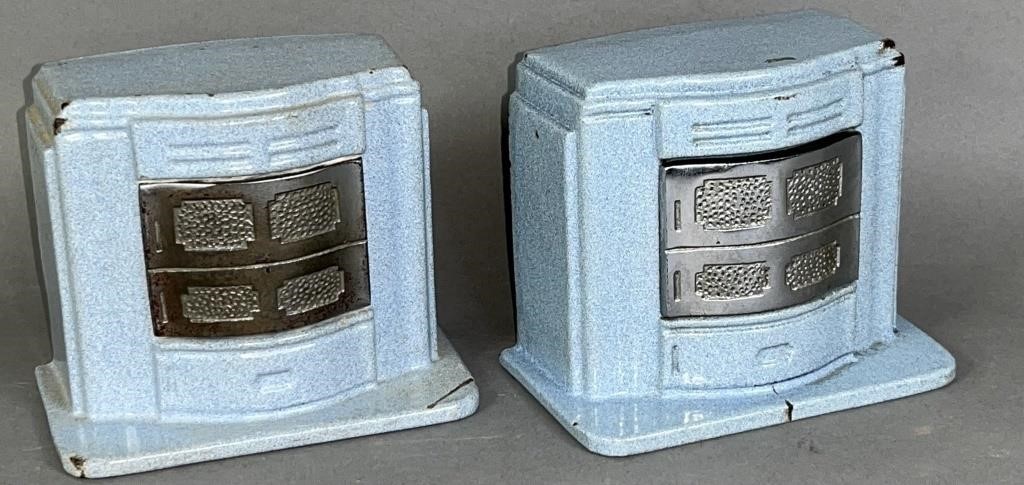 2 enameled iron stove shaped banks ca. 1930; both