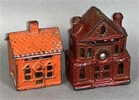 2 cast iron house shaped banks ca. 1900-1930;