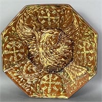 Folk art redware slip decorated octagon bowl by