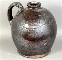PA manganese glazed redware ovoid jug ca. 1850;