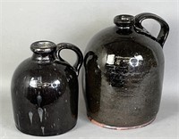 2 PA manganese glazed redware cylindrical jugs