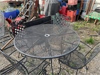 Cast iron table and 4 chairs
