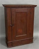 Hanging cabinet ca. 1810; in cherry with an old