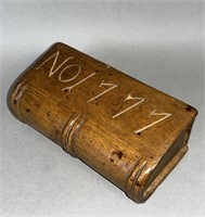 Carved walnut book shaped slide lid box ca. 1777
