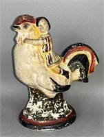 Rare child on rooster chalkware figure ca.