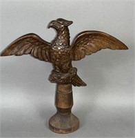 Carved eagle crest on wooden turned stand ca.
