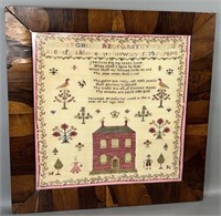 Framed early two story house form sampler by