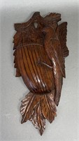 Fine folk art carved oriole and nest walnut wall