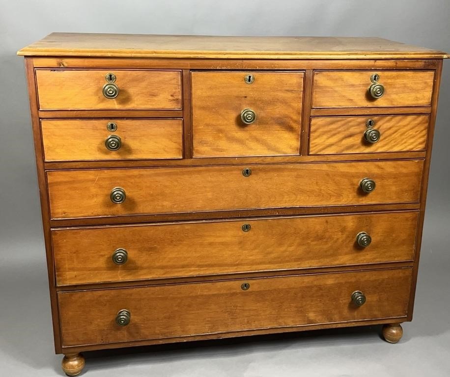 Chest of drawers ca. 1830; mixed wood with a
