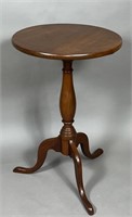 Candlestand ca. 1820; in cherry with a stationary