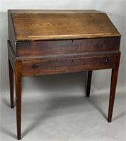 Desk on stand ca. 1810; in walnut with a slant