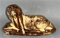Redware recumbent dog figurine ca. 1880; hollow