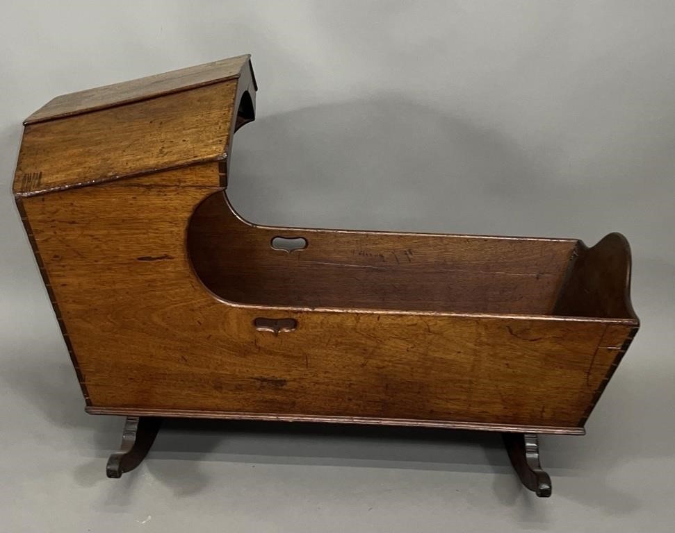 Hooded cradle ca. 1800; in walnut with heart cut
