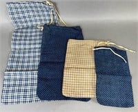 4 vintage fabric seed pouches ca. 20th century;