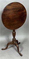 Tilt top candlestand ca. 1790; in mahogany with a