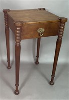 One drawer stand ca. 1820; in mahogany with a