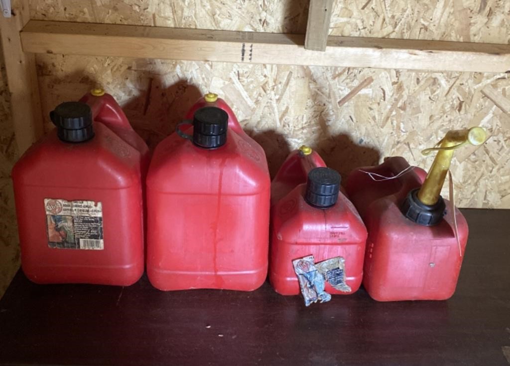 4 Gas Cans with Fuel Unknown