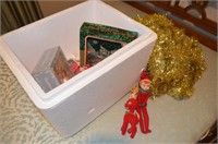 Box of Christmas Items with Elf