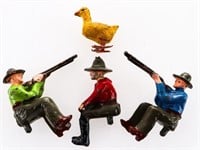 Grouping of 4 Cast Iron Collectible Figures