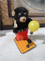 VINTAGE METAL BEAR WITH PUNCHING BAG WIND UP TOY