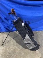 Golf bag with Toney Panna woods, other woods and