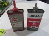 Kirby and Sinclair oil cans