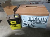 Sinclair motor oil sign and John Deere container