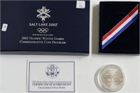 OLYMPIC SILVER DOLLAR W BOX PAPERS