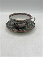 Antique Chinese famille rose cup and saucer Red