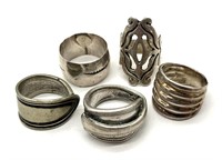 (5) Unmarked Rings Sizes 7.5, 5, 8.5, and 7